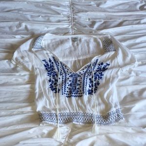 Short white and blue shirt